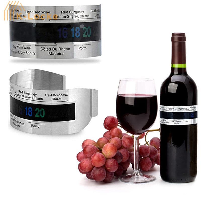 Wine bottle, glass, and grapes with digital wine temperature计器