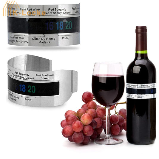 Wine bottle, glass, and grapes with digital wine temperature计器