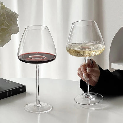 Burgundy crystal wine glasses with red and white wine, showcasing versatile stemware for elegant dining and wine tasting