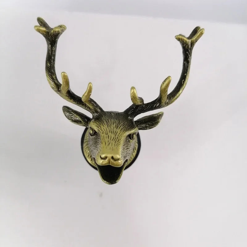 Decorative deer head with antlers on a white background