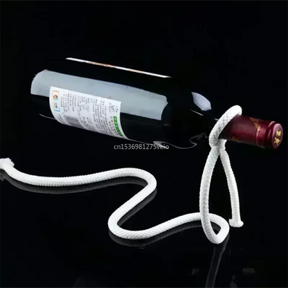 Wine bottle with a white rope attached on a black background