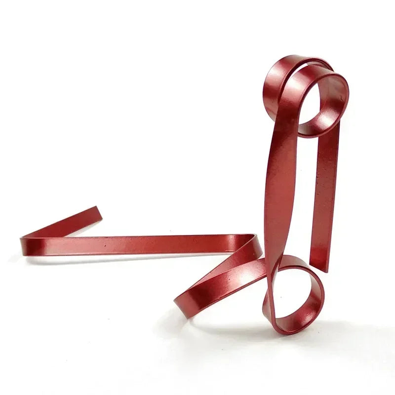 Red ribbon wine rack on a white background