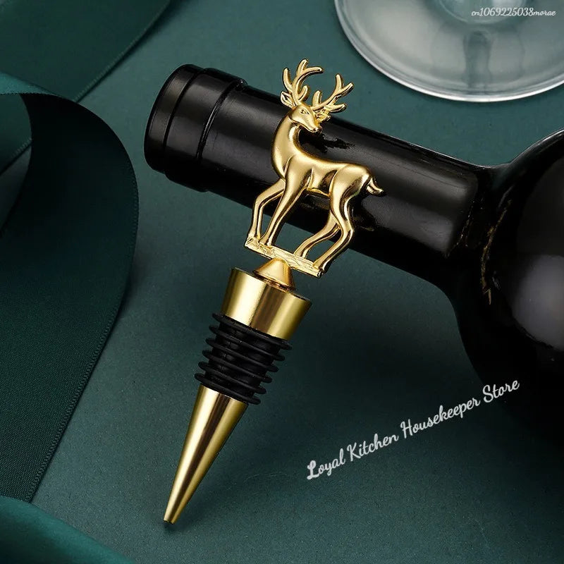 Gold deer-shaped bottle stopper on a dark green surface with 'Loyal Kitchen Housekeeper Store' branding.