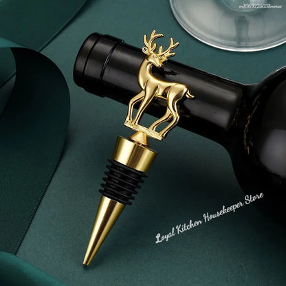 Gold deer-shaped bottle stopper on a dark green surface with 'Loyal Kitchen Housekeeper Store' branding.
