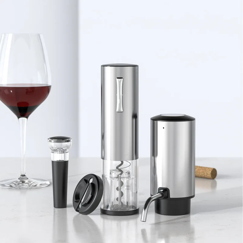 Set of wine accessories featuring an electric wine opener, vacuum bottle stopper, foil cutter, aerator and dispenser with a wine glass