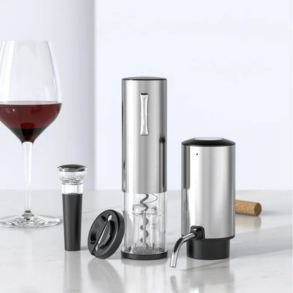 Set of wine accessories featuring an electric wine opener, vacuum bottle stopper, foil cutter, aerator and dispenser with a wine glass