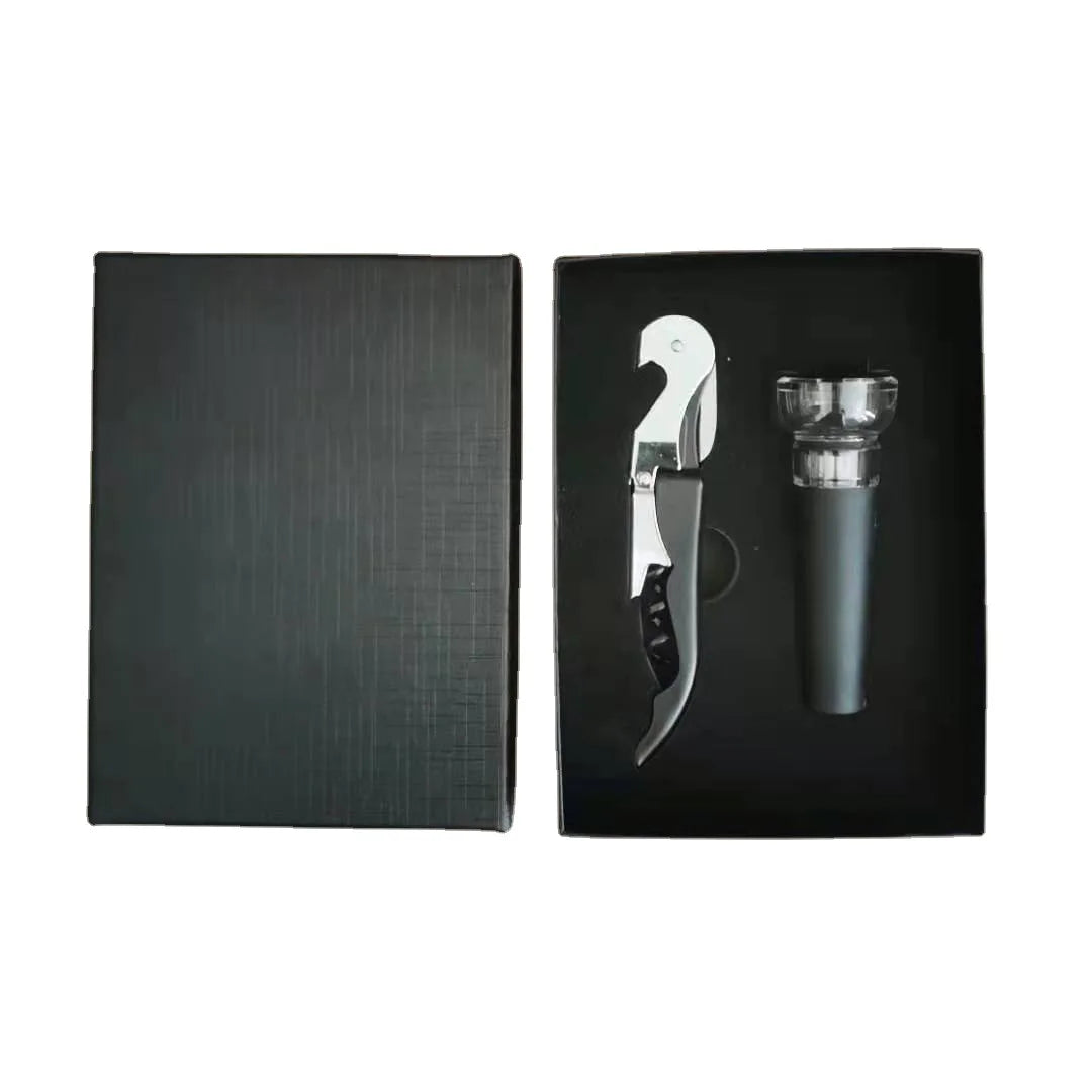 Wine opener and dealer set in a black box on a white background