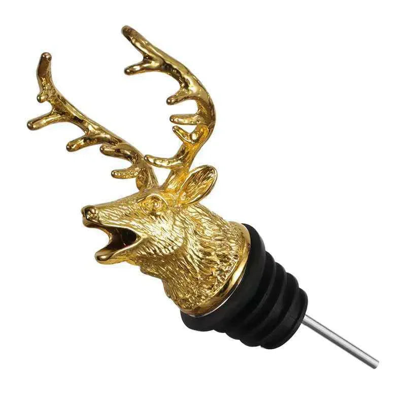 Gold deer head bottle stopper on a white background

