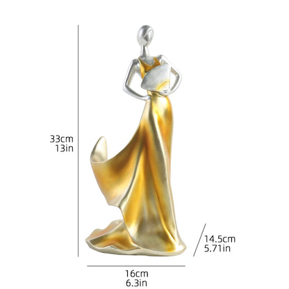 Decorative woman-shaped wine bottle holder with gold and silver dress, shown with measurements on a white background.