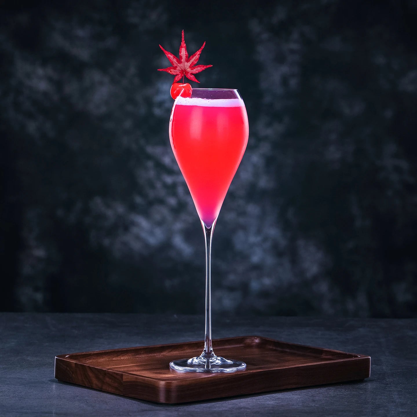 Red cocktail served in a CRISON crystal champagne glass, showcasing elegant stemware for cocktails, sparkling wine, and stylish entertaining