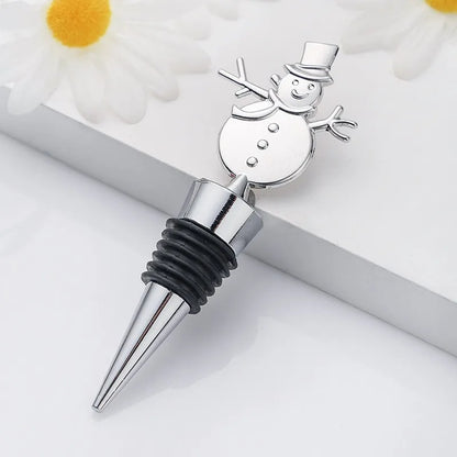 Silver snowman bottle stopper on a white background
