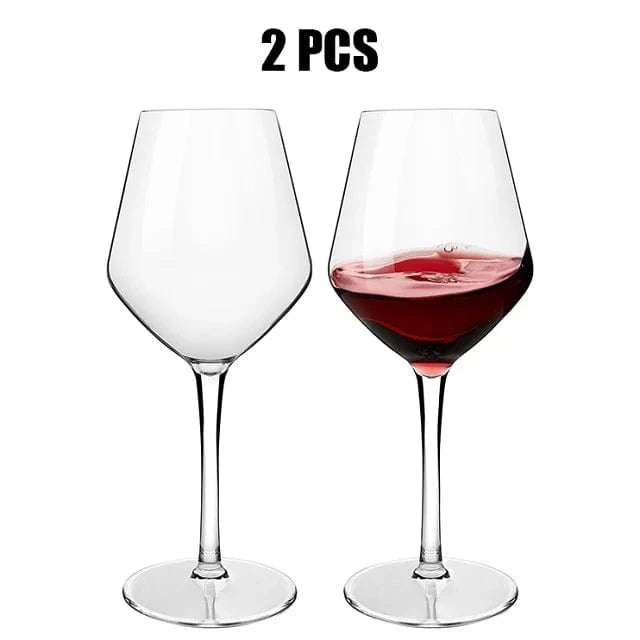 Two wine glasses on a white background, one filled with red wine for tasting
