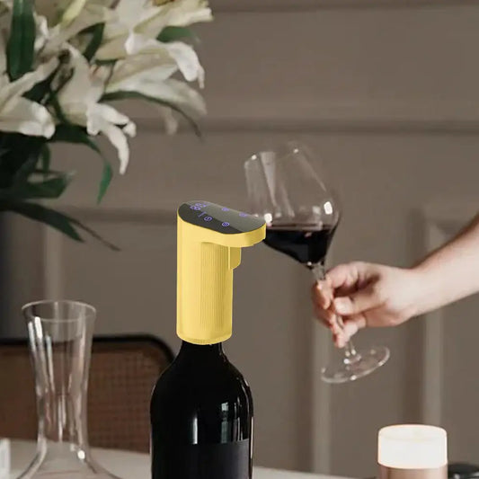 Yellow wine bottle stopper on a bottle with a glass of red wine in the background