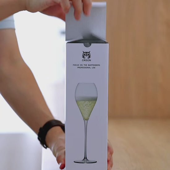 Video showing CRISON crystal glassware gift box with wine being poured into elegant stemware, highlighting premium gifting and refined entertaining experience